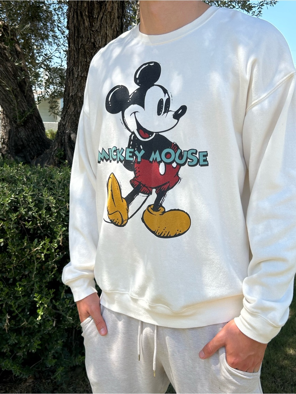 Disney Mickey Mouse sweatshirt. Cream w/handdrawn Mickey & name across center XL